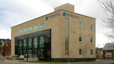 NU
