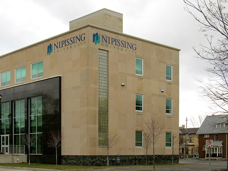 NU